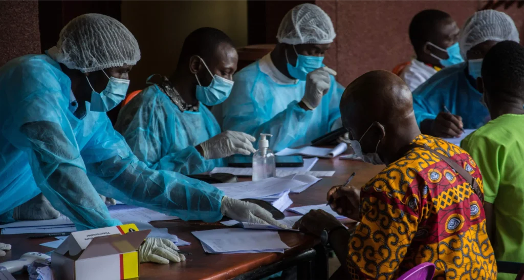 Health workers from the Guinean Ministry of Health registering medical staff for the Ebola vaccine in February 2021 at the N'Zérékoré Hospital